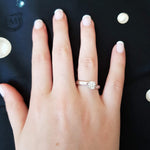 diamond solitaire ring on fingures face up