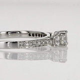 three stone ring, round diamond engagement ring side view
