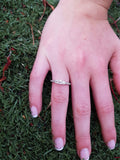 three stone ring, round diamond engagement ring on the hand- true love jewelry Engagement Rings